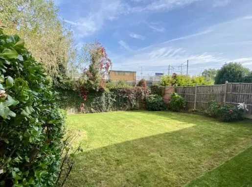 Professional Garden Clearance in Lea Valley | Fast & Reliable Service Overgrown garden before and after professional clearance in Lea Valley. Gardeners removing weeds and unwanted vegetation.